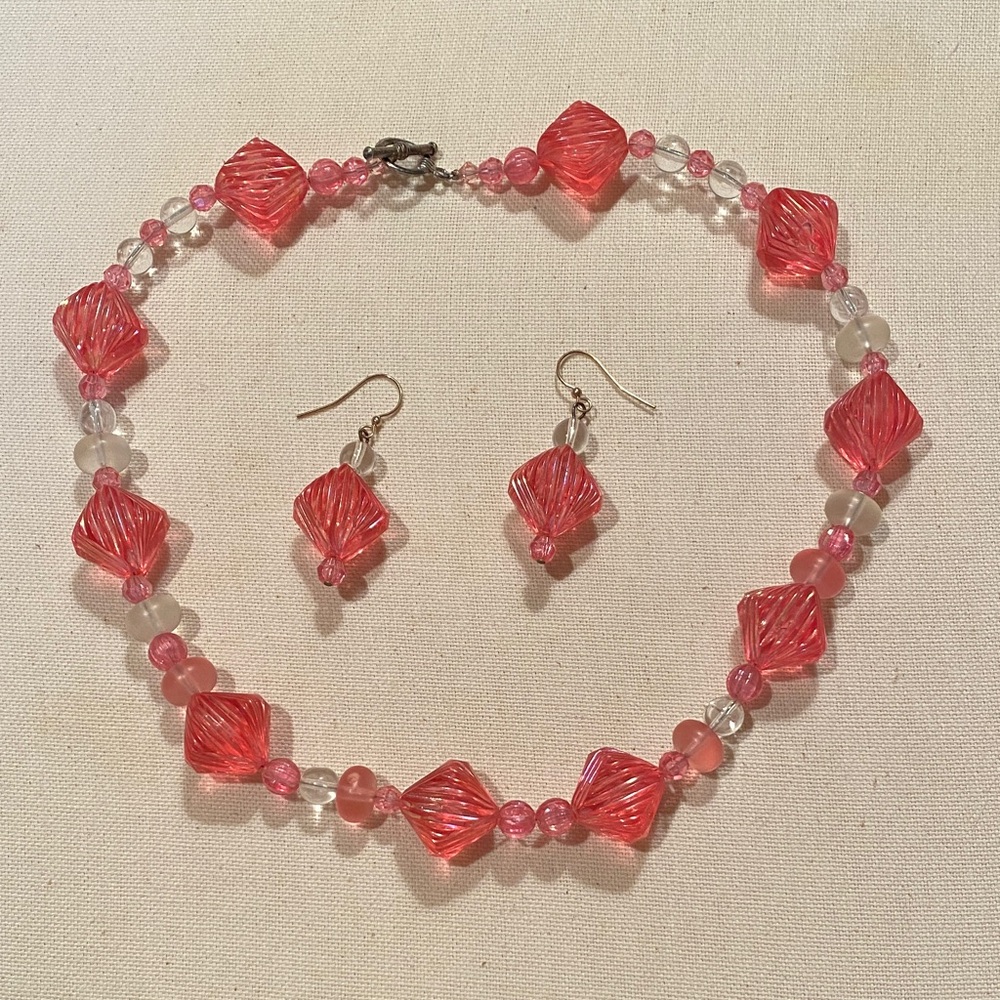 Pink iridescent square beads from the 1940’s, restrung with new beads. 20”